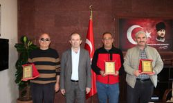 Emekliliğe ayrılan personeller plaketle uğurlandı