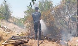 Arazide çıkan yangın bağ evine sıçramadan söndürüldü