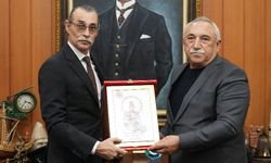 Başkan Ali Kaim’den Başkan Erdal Beşikçioğlu’na ziyaret