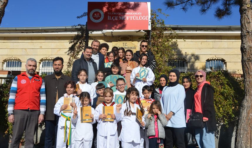 Ürgüp’te öğrencilere Kur’an-ı Kerim hediye edildi